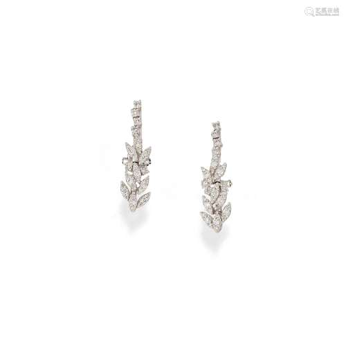 A 18K white gold and diamond earrings