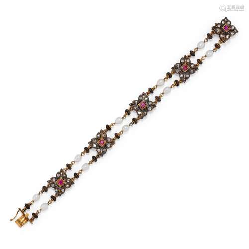 A 18K yellow gold and silver, diamond, ruby and cultured pea...