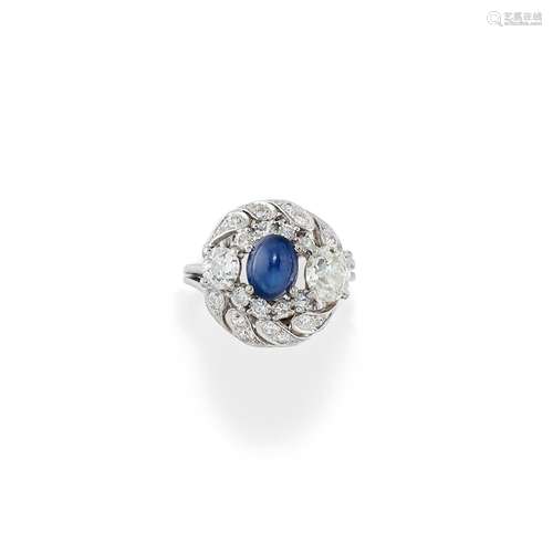 A 18K white gold, diamond and sapphire ring