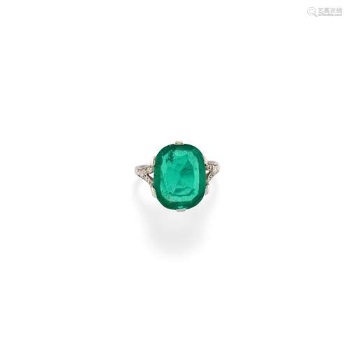 A platinum, diamond and emerald ring, early 20th Century