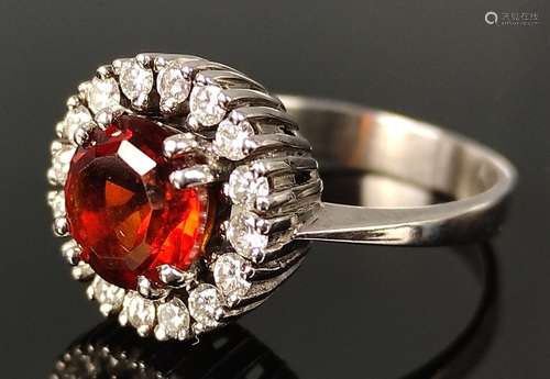 Fire opal ring, around it 16 diamonds around ca. 0…