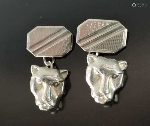 Pair of panther cufflinks, front sides in shape of…