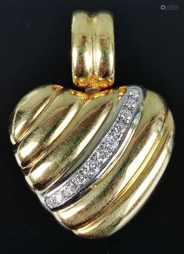 Heart pendant, set with 11 diamonds, together arou…