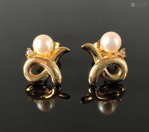 Pair of stud earrings, each with a small pearl and…