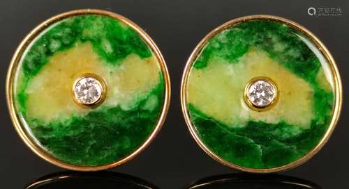 Pair of earrings, discs of jadeite, each centered …