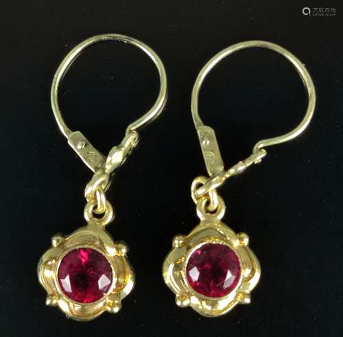 Pair of earrings, centered with round faceted pink…