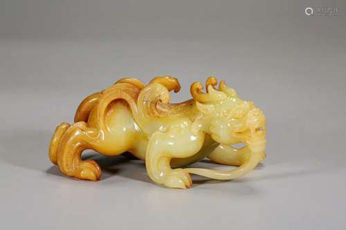 A Yellow and Russet Jade Beast Carving Han Dyn.