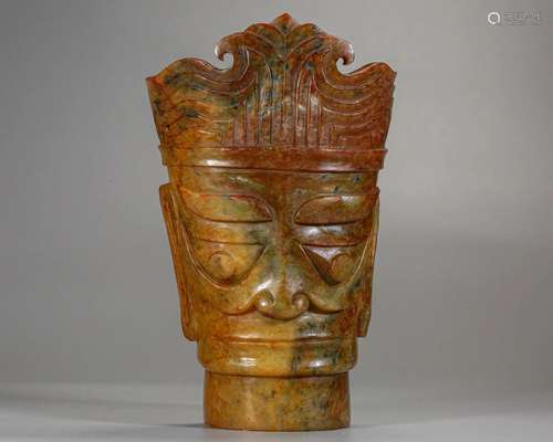 A Carved Russet Jade Mask Han Dyn.