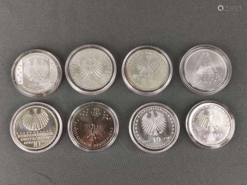 8 silver coins, commemorative, 10 euro each, sterl…