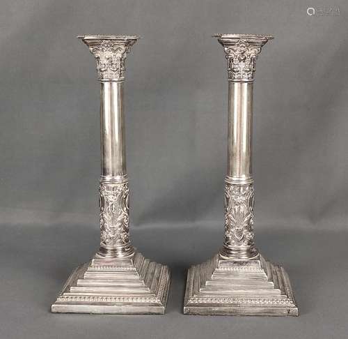 Two large candlesticks, rectangular stepped stand,…