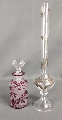 Two glass objects, a slender vase with silver flow…