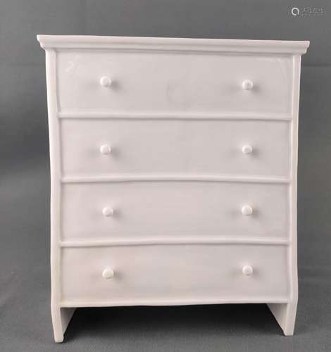 Porcelain chest of drawers with four indicated dra…