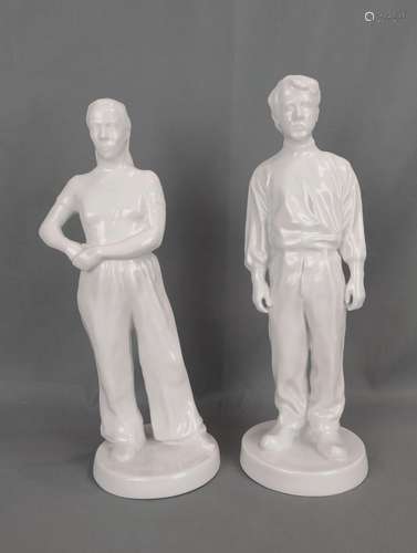 Pair of figures, "woman" and "man", each...