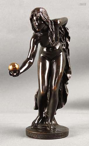 Female ball player, female nude, holding a golden …