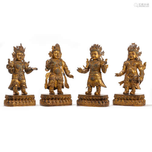 A GROUP OF CHINESE MING DYNASTY GILT BRONZE FOUR KING KONG B...