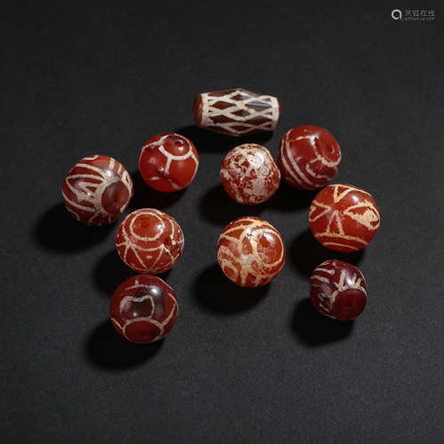 A GROUP OF CHINESE AGATE BEADS, TANG DYNASTY