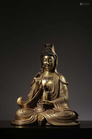 A gilt bronze statue of Guanyin in a pure vase, “Ming Yongle...