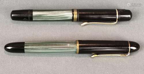 Two Pelikan fountain pens, both with pelican tip (one 585/14...