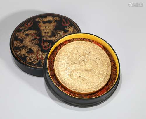 A LACQUER ENGRAVED  CLOUD AND DRAGON INK STICK OF STATE
