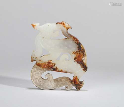 A HETIAN JADE DRAGON SHAPED PENDANT