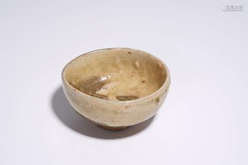 A CELADON-GLAZED BOWL