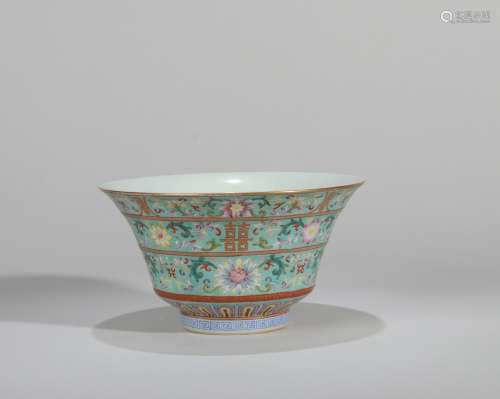 A TURQUOISE GROUND FAMILLE ROSE XI CHARACTER BOWL