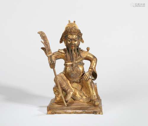 A BRONZE SEATED STATUE OF GUAN YOU