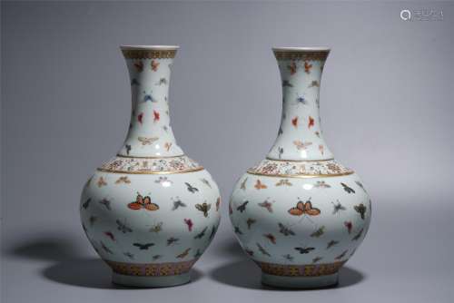 A PAIR OF FAMILLE ROSE HUNDRED BUTTERFLY VASES