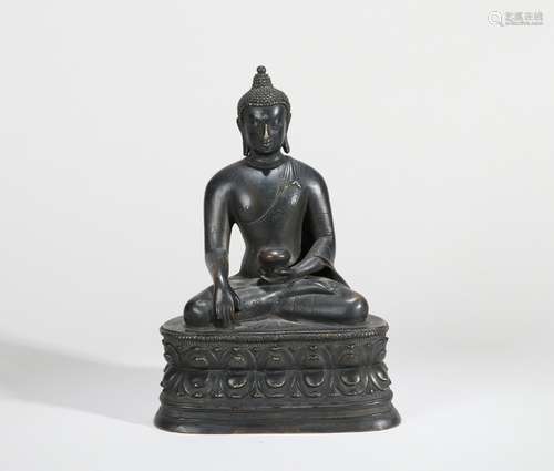 A BRONZE SEATED STATUE OF MEDICINE BUDDHA