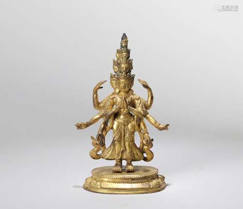 A GILT-BRONZE ELEVEN-FACED AVALOKITESVARA