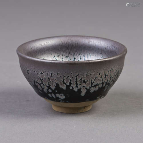 A BLACK GLAZED PROCELAIN BOWL