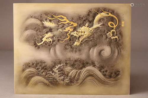 A GOLD-INLAID CARVED 'DRAGON' SILVER PLAQUE