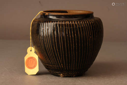 A TENMOKU BLACK-GLAZED RIBBED JAR