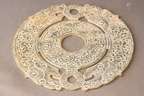 AN ARCHAIC JADE 'DRAGON' DISC, BI