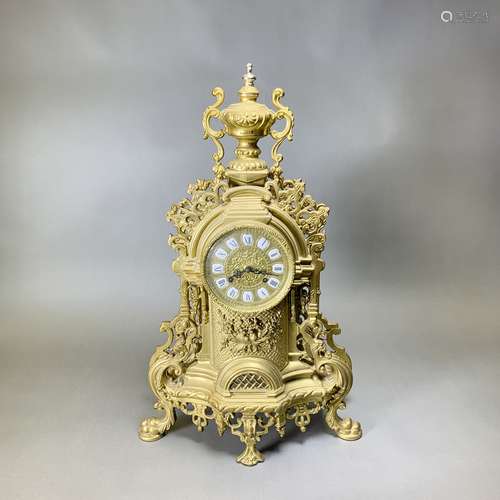 A GILT-BROZE EMPIRE CLOCK