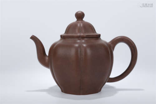 A Six-Arris Purple Clay Teapot.