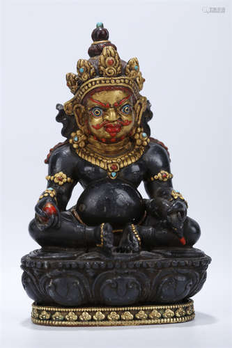 A Black Stone Yellow Wealthy Buddha Statue.