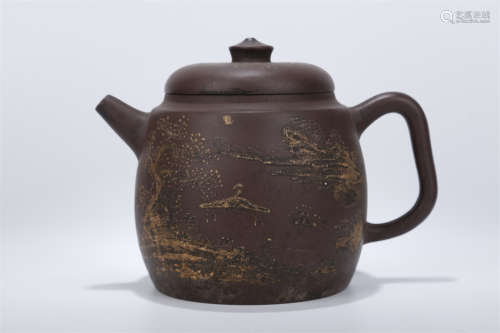A Purple Clay Teapot with Landscape Design.