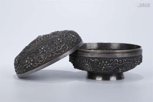 A Silver Lidded Box with Auspicious Design.