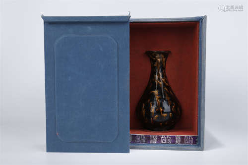 A Black Glazed Yuhu Spring Porcelain Bottle.