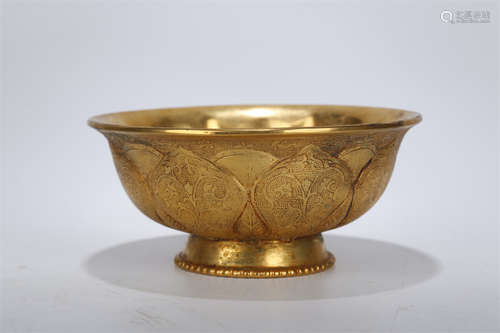 A Gilt Copper Bowl with Lotus Petals Design.