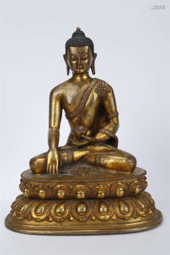 A Gilt Copper Sakyamuni Buddha Statue.