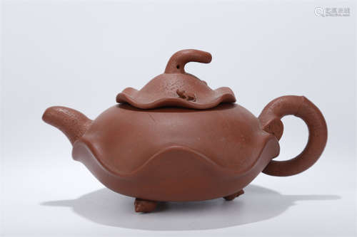 A Lotus Leaf Shaped Purple Clay Teapot.