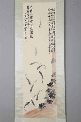 A Fish Painting on Paper by Qi Baishi.