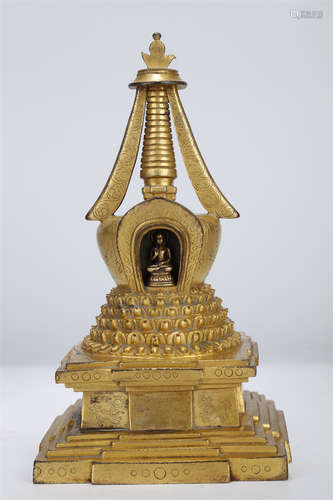 A Gilt Copper Buddhist Stupa.