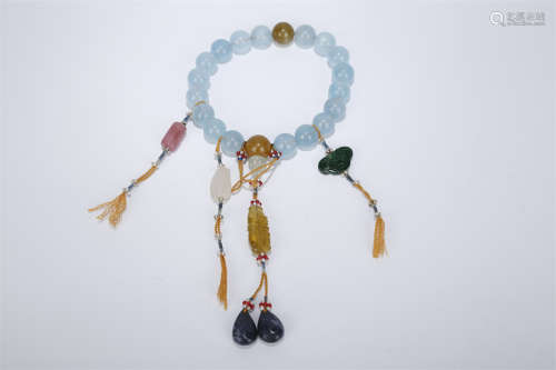 A String of Handheld Aquamarine Beads.