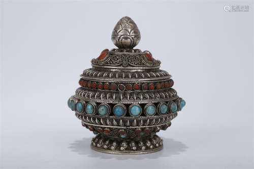 A Silver Lidded Pot, Inlaid with Jewels.