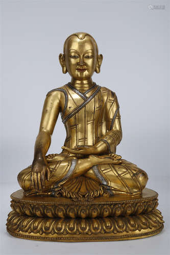 A Gilt Copper Guru Buddha Statue.