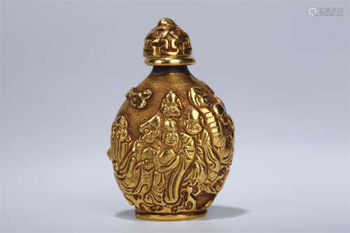 A Gilt Copper Snuff Bottle.