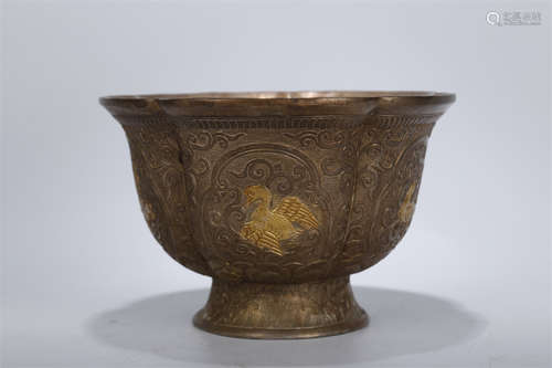 A Copper Bowl with Ducks Design.